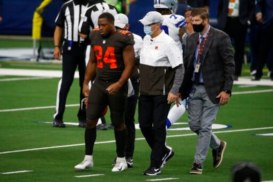 Cleveland Browns running back Nick Chubb (24) is assisted off the field by staff after suffering an unknown injury in the first half of an NFL football game against the Dallas Cowboys in Arlington, Texas, Sunday, Oct. 4, 2020. (AP Photo/Michael Ainsworth) Cleveland Browns running back Nick Chubb (24) is assisted off the field by staff after suffering an unknown injury in the first half of an NFL football game against the Dallas Cowboys in Arlington, Texas, Sunday, Oct. 4, 2020. (AP Photo/Michael Ainsworth)