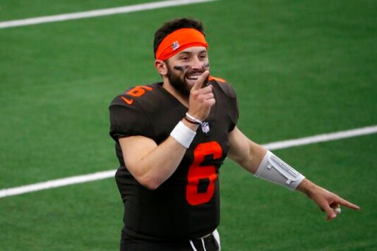 Cleveland Browns quarterback Baker Mayfield (6) celebrates on the field after their 49-38 win against the Dallas Cowboys in an NFL football game in Arlington, Texas, Sunday, Oct. 4, 2020. (AP Photo/Michael Ainsworth)