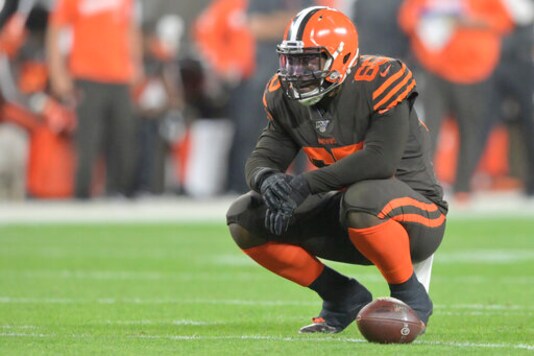 FILE - In this Sept. 22, 2019, file photo, Cleveland Browns defensive tackle Larry Ogunjobi (65) reacts during an NFL football game against the Los Angeles Rams in Cleveland. The Browns will be without one of their best defensive players Sunday against Indianapolis as Ogunjobi will sit out with an abdominal injury. (AP Photo/David Richard, File) FILE - In this Sept. 22, 2019, file photo, Cleveland Browns defensive tackle Larry Ogunjobi (65) reacts during an NFL football game against the Los Angeles Rams in Cleveland. The Browns will be without one of their best defensive players Sunday against Indianapolis as Ogunjobi will sit out with an abdominal injury. (AP Photo/David Richard, File)