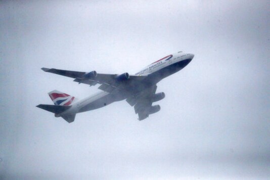 CAPTION OMITS INFO ON DUAL TAKE OFF Aircraft G-CIVY, one of the last two British Airways Boeing 747-400 aircraft takes off for its last flight departure from London's Heathrow Airport, Thursday, Oct. 8, 2020. The retirement of the fleet was brought forward as a result of the impact the Covid-19 pandemic had on the airline and the aviation sector. (Andrew Matthews/PA via AP) CAPTION OMITS INFO ON DUAL TAKE OFF Aircraft G-CIVY, one of the last two British Airways Boeing 747-400 aircraft takes off for its last flight departure from London's Heathrow Airport, Thursday, Oct. 8, 2020. The retirement of the fleet was brought forward as a result of the impact the Covid-19 pandemic had on the airline and the aviation sector. (Andrew Matthews/PA via AP)