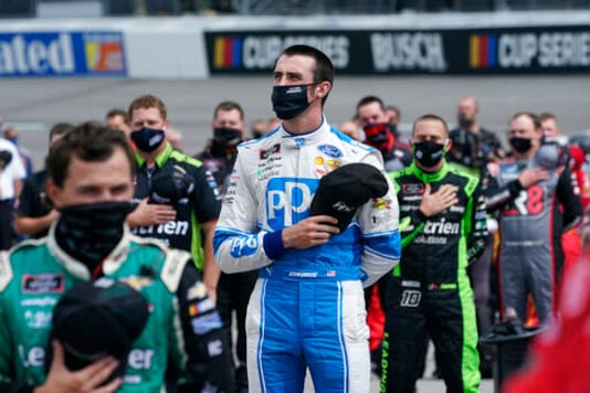 CORRECTS DATE TO SEPT. 12-Austin Cindric (22) puts his hat to his heart during the National anthem prior to the start of a NASCAR Xfinity Series auto race Saturday, Sept. 1, 2020, in Richmond, Va. (AP Photo/Steve Helber) CORRECTS DATE TO SEPT. 12-Austin Cindric (22) puts his hat to his heart during the National anthem prior to the start of a NASCAR Xfinity Series auto race Saturday, Sept. 1, 2020, in Richmond, Va. (AP Photo/Steve Helber)