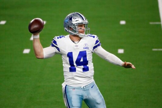 Dallas Cowboys' Andy Dalton (14) throws a pass in the second half of an NFL football game against the Arizona Cardinals in Arlington, Texas, Monday, Oct. 19, 2020. (AP Photo/Michael Ainsworth) Dallas Cowboys' Andy Dalton (14) throws a pass in the second half of an NFL football game against the Arizona Cardinals in Arlington, Texas, Monday, Oct. 19, 2020. (AP Photo/Michael Ainsworth)