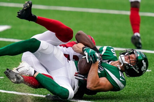 New York Jets wide receiver Chris Hogan (15) is tackled by Arizona Cardinals cornerback Patrick Peterson during the first half of an NFL football game, Sunday, Oct. 11, 2020, in East Rutherford. (AP Photo/Frank Franklin II) New York Jets wide receiver Chris Hogan (15) is tackled by Arizona Cardinals cornerback Patrick Peterson during the first half of an NFL football game, Sunday, Oct. 11, 2020, in East Rutherford. (AP Photo/Frank Franklin II)