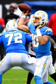 Los Angeles Chargers quarterback Justin Herbert (10) throws a pass against the Tampa Bay Buccaneers during the first half of an NFL football game Sunday, Oct. 4, 2020, in Tampa, Fla. (AP Photo/Jason Behnken)