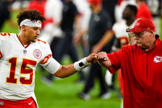 Kansas City Chiefs quarterback Patrick Mahomes (15) and head coach Andy Reid bump fists after an NFL football game against the Baltimore Ravens, Monday, Sept. 28, 2020, in Baltimore. The Chiefs won 34-20. (AP Photo/Gail Burton) Kansas City Chiefs quarterback Patrick Mahomes (15) and head coach Andy Reid bump fists after an NFL football game against the Baltimore Ravens, Monday, Sept. 28, 2020, in Baltimore. The Chiefs won 34-20. (AP Photo/Gail Burton)