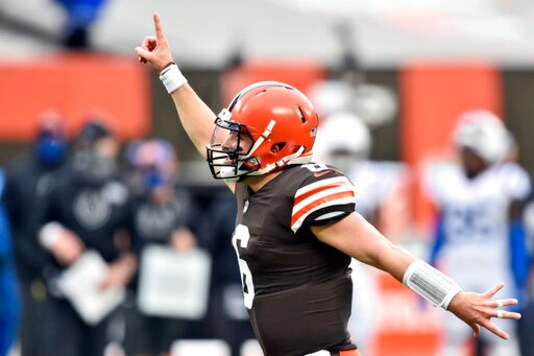 Cleveland Browns quarterback Baker Mayfield celebrates a 15-yard touchdown pass to wide receiver Rashard Higgins during the first half of an NFL football game against the Indianapolis Colts, Sunday, Oct. 11, 2020, in Cleveland. (AP Photo/David Richard) Cleveland Browns quarterback Baker Mayfield celebrates a 15-yard touchdown pass to wide receiver Rashard Higgins during the first half of an NFL football game against the Indianapolis Colts, Sunday, Oct. 11, 2020, in Cleveland. (AP Photo/David Richard)