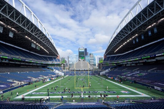 CenturyLink Field is shown as the Seattle Seahawks and the Dallas Cowboys warm up before an NFL football game, Sunday, Sept. 27, 2020, in Seattle. (AP Photo/Elaine Thompson) CenturyLink Field is shown as the Seattle Seahawks and the Dallas Cowboys warm up before an NFL football game, Sunday, Sept. 27, 2020, in Seattle. (AP Photo/Elaine Thompson)