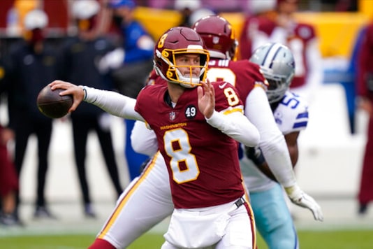 Washington Football Team quarterback Kyle Allen (8) passing the ball in the first half of an NFL football game against Dallas Cowboys, Sunday, Oct. 25, 2020, in Landover, Md. (AP Photo/Patrick Semansky) Washington Football Team quarterback Kyle Allen (8) passing the ball in the first half of an NFL football game against Dallas Cowboys, Sunday, Oct. 25, 2020, in Landover, Md. (AP Photo/Patrick Semansky)