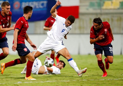 Cyprus' Dimitris Christofi, centre, controls the ball during an international friendly soccer match between Cyprus and Czech Republic at AEK arena in Larnaca, Cyprus, on Wednesday, Oct. 7, 2020. (AP Photo/Petros Karadjias)