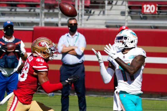 Miami Dolphins wide receiver DeVante Parker (11) catches a touchdown against San Francisco 49ers cornerback Brian Allen (48) during the first half of an NFL football game in Santa Clara, Calif., Sunday, Oct. 11, 2020. (AP Photo/Tony Avelar)