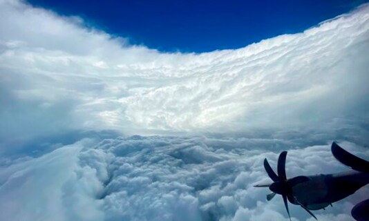This photo provided by Air Force Reserve shows a sky view of Hurricane Epsilon taken by Air Force Reserve hurricane hunter team over the Atlantic Ocean taken Wednesday, Oct. 21, 2020.   Epsilons maximum sustained winds have dropped slightly as it prepares to sideswipe Bermuda on a path over the Atlantic Ocean.  The National Hurricane Center says it should come close enough Thursday, Oct. 22, evening to merit a tropical storm warning for the island.  (Air Force Reserve via AP)