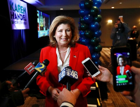 Republican Karen Handel, speaking in a Tuesday, Nov. 6, 2018 file photo in Atlanta, is seeking to reclaim the seat she once held representing suburban Atlantas 6th Congressional District. She debated Tuesday, Oct. 13, 2020 with her general election opponent, Democratic U.S. Rep. Lucy McBath, who narrowly beat Handel in 2018 to claim the seat in an affluent district that includes parts of Cobb, Fulton and DeKalb counties. (Curtis Compton/Atlanta Journal-Constitution via AP) Republican Karen Handel, speaking in a Tuesday, Nov. 6, 2018 file photo in Atlanta, is seeking to reclaim the seat she once held representing suburban Atlantas 6th Congressional District. She debated Tuesday, Oct. 13, 2020 with her general election opponent, Democratic U.S. Rep. Lucy McBath, who narrowly beat Handel in 2018 to claim the seat in an affluent district that includes parts of Cobb, Fulton and DeKalb counties. (Curtis Compton/Atlanta Journal-Constitution via AP)