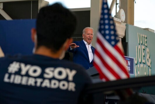 Democratic presidential candidate former Vice President Joe Biden speaks at Miramar Regional Park in Miramar, Fla., Tuesday Oct. 13, 2020, as supporters watch from their cars. (AP Photo/Carolyn Kaster) Democratic presidential candidate former Vice President Joe Biden speaks at Miramar Regional Park in Miramar, Fla., Tuesday Oct. 13, 2020, as supporters watch from their cars. (AP Photo/Carolyn Kaster)