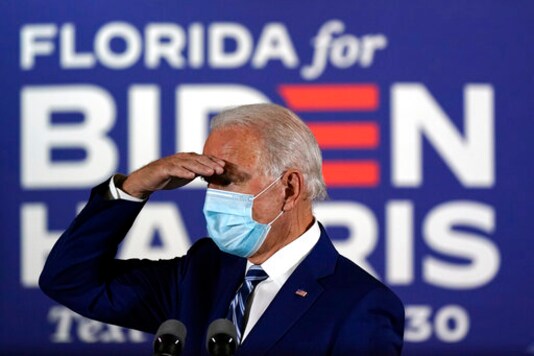 Democratic presidential candidate former Vice President Joe Biden arrives to speak at Southwest Focal Point Community Center in Pembroke Pines, Fla., Tuesday Oct. 13, 2020. (AP Photo/Carolyn Kaster) Democratic presidential candidate former Vice President Joe Biden arrives to speak at Southwest Focal Point Community Center in Pembroke Pines, Fla., Tuesday Oct. 13, 2020. (AP Photo/Carolyn Kaster)