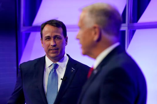 Democratic challenger Cal Cunningham, left, and U.S. Sen. Thom Tillis, R-N.C. talk during a televised debate Thursday, Oct. 1, 2020 in Raleigh, N.C. (AP Photo/Gerry Broome, Pool) Democratic challenger Cal Cunningham, left, and U.S. Sen. Thom Tillis, R-N.C. talk during a televised debate Thursday, Oct. 1, 2020 in Raleigh, N.C. (AP Photo/Gerry Broome, Pool)