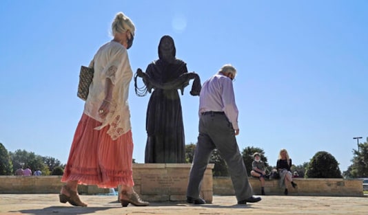 A bronze statue of Jesus Christ sits on display outside of the Prestonwood Baptist Church Sunday, Oct. 11, 2020, in Plano, Texas. Evangelical churches and their suburban members are a key to President Donald Trump's voter support in Texas. (AP Photo/LM Otero) A bronze statue of Jesus Christ sits on display outside of the Prestonwood Baptist Church Sunday, Oct. 11, 2020, in Plano, Texas. Evangelical churches and their suburban members are a key to President Donald Trump's voter support in Texas. (AP Photo/LM Otero)