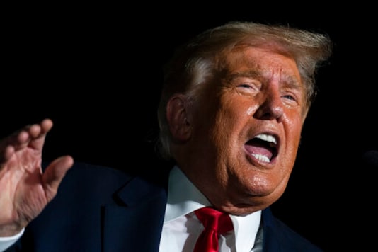 President Donald Trump speaks during a campaign rally at Orlando Sanford International Airport, Monday, Oct. 12, 2020, in Sanford, Fla. (AP Photo/Evan Vucci) President Donald Trump speaks during a campaign rally at Orlando Sanford International Airport, Monday, Oct. 12, 2020, in Sanford, Fla. (AP Photo/Evan Vucci)