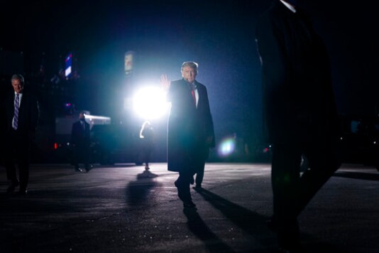 President Donald Trump waves after a campaign rally at Erie International Airport, Tom Ridge Field, Tuesday, Oct. 20, 2020, in Erie, Pa. (AP Photo/Evan Vucci) President Donald Trump waves after a campaign rally at Erie International Airport, Tom Ridge Field, Tuesday, Oct. 20, 2020, in Erie, Pa. (AP Photo/Evan Vucci)