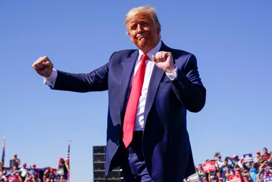 President Donald Trump dances after speaking at a campaign rally at Prescott Regional Airport, Monday, Oct. 19, 2020, in Prescott, Ariz. (AP Photo/Alex Brandon) President Donald Trump dances after speaking at a campaign rally at Prescott Regional Airport, Monday, Oct. 19, 2020, in Prescott, Ariz. (AP Photo/Alex Brandon)