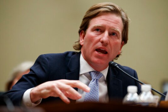 FILE - In this May 22, 2019 file photo, Department of Homeland Security Cybersecurity and Infrastructure Security Agency Director Christopher Krebs testifies on Capitol Hill in Washington. In a complex intimidation operation, Democratic voters in at least four battleground states including Florida and Pennsylvania have been sent emails purporting to come from the neo-fascist group Proud Boys _ but actually spoofed. Krebs, says, Wednesday, Oct. 21, 2020, that voters should not fall for sensational and unverified claims, reminding them that ballot secrecy is guaranteed. (AP Photo/Carolyn Kaster, File) FILE - In this May 22, 2019 file photo, Department of Homeland Security Cybersecurity and Infrastructure Security Agency Director Christopher Krebs testifies on Capitol Hill in Washington. In a complex intimidation operation, Democratic voters in at least four battleground states including Florida and Pennsylvania have been sent emails purporting to come from the neo-fascist group Proud Boys _ but actually spoofed. Krebs, says, Wednesday, Oct. 21, 2020, that voters should not fall for sensational and unverified claims, reminding them that ballot secrecy is guaranteed. (AP Photo/Carolyn Kaster, File)