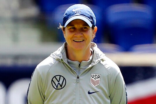 FILE - In this May 25, 2019, file photo, United States women's national soccer team head coach Jill Ellis smiles during a training session at Red Bull Arena, in Harrison, N.J. When Ellis stepped down as coach of the national team last year, U.S. soccer announced that it would endow a scholarship in Ellis' name to support female candidates in pursuit of Pro, A and B coaching license courses. On Tuesday, Oct. 6, 2020, the federation announced the SheChampions Mentorship Program, designed to support each Pro and A license candidate. Ellis is among those who will mentor the women in the program.  (AP Photo/Steve Luciano, File)