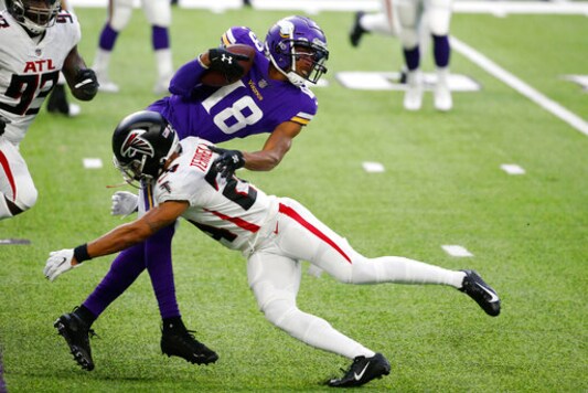 Minnesota Vikings wide receiver Justin Jefferson (18) is tackled by Atlanta Falcons cornerback A.J. Terrell during the first half of an NFL football game, Sunday, Oct. 18, 2020, in Minneapolis. (AP Photo/Bruce Kluckhohn) Minnesota Vikings wide receiver Justin Jefferson (18) is tackled by Atlanta Falcons cornerback A.J. Terrell during the first half of an NFL football game, Sunday, Oct. 18, 2020, in Minneapolis. (AP Photo/Bruce Kluckhohn)