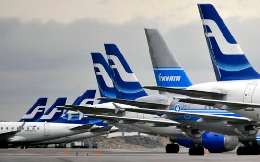 FILE - In this Monday, Nov. 16, 2009 file photo, passenger planes of the Finnish national airline company Finnair stand on the tarmac at Helsinki international airport, Helsinki. Finnish carrier Finnair will start selling business class airplane food in supermarkets in a move to keep its catering staff employed and to offer a taste of the airline experience to those missing flying in the COVID-19 times. The state-controlled airline said that in a pilot scheme the handmade meals, called Taste of Finnair FILE - In this Monday, Nov. 16, 2009 file photo, passenger planes of the Finnish national airline company Finnair stand on the tarmac at Helsinki international airport, Helsinki. Finnish carrier Finnair will start selling business class airplane food in supermarkets in a move to keep its catering staff employed and to offer a taste of the airline experience to those missing flying in the COVID-19 times. The state-controlled airline said that in a pilot scheme the handmade meals, called Taste of Finnair
