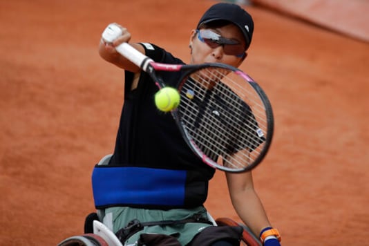 Japan's Momoko Ohtani plays a shot against Japan's Yui Kamiji in the women's wheelchair final match of the French Open tennis tournament at the Roland Garros stadium in Paris, France, Friday, Oct. 9, 2020. (AP Photo/Alessandra Tarantino) Japan's Momoko Ohtani plays a shot against Japan's Yui Kamiji in the women's wheelchair final match of the French Open tennis tournament at the Roland Garros stadium in Paris, France, Friday, Oct. 9, 2020. (AP Photo/Alessandra Tarantino)