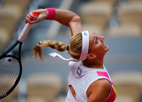 Petra Kvitova of the Czech Republic serves against Germany's Laura Siegemund in the quarterfinal match of the French Open tennis tournament at the Roland Garros stadium in Paris, France, Wednesday, Oct. 7, 2020. (AP Photo/Christophe Ena)