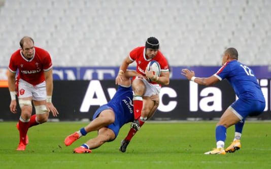 Leigh Halfpenny of Wales, center, is tackled during the rugby union international match between France and Wales at the Stade de France in Saint-Denis, near Paris, France, Saturday, Oct. 24, 2020. (AP Photo/Lewis Joly) Leigh Halfpenny of Wales, center, is tackled during the rugby union international match between France and Wales at the Stade de France in Saint-Denis, near Paris, France, Saturday, Oct. 24, 2020. (AP Photo/Lewis Joly)