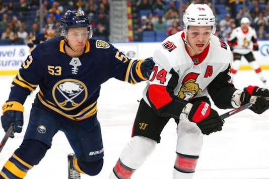 FILE - In this Tuesday, Jan. 28, 2020, file photo, Buffalo Sabres forward Jeff Skinner (53) and then-Ottawa Senators defenseman Mark Borowiecki (74) vie for the puck during the third period of an NHL hockey game in Buffalo, N.Y. The Nashville Predators bulked up on the blue line by signing Boro Cop Mark Borowiecki, (AP Photo/Jeffrey T. Barnes, File) FILE - In this Tuesday, Jan. 28, 2020, file photo, Buffalo Sabres forward Jeff Skinner (53) and then-Ottawa Senators defenseman Mark Borowiecki (74) vie for the puck during the third period of an NHL hockey game in Buffalo, N.Y. The Nashville Predators bulked up on the blue line by signing Boro Cop Mark Borowiecki, (AP Photo/Jeffrey T. Barnes, File)