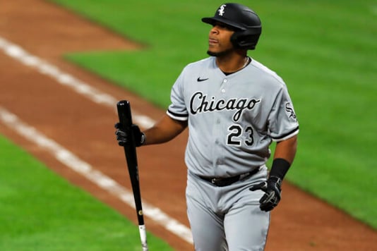 FILE - In this Sept. 18, 2020, file photo, Chicago White Sox' Edwin Encarnacion reacts during a baseball game against the Cincinnati Reds in Cincinnati. About 50 players would be eligible for free agency if their options are declined by Sunday, among them the White Sox designated hitter Edwin Encarnacion. (AP Photo/Aaron Doster, File) FILE - In this Sept. 18, 2020, file photo, Chicago White Sox' Edwin Encarnacion reacts during a baseball game against the Cincinnati Reds in Cincinnati. About 50 players would be eligible for free agency if their options are declined by Sunday, among them the White Sox designated hitter Edwin Encarnacion. (AP Photo/Aaron Doster, File)