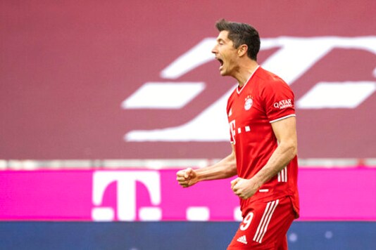 Robert Lewandowski of Munich celebrates his opening goal during a German Bundesliga soccer match between Bayern Munich and Eintracht Frankfurt in Munich, Gdermany, Saturday, Oct.24, 2020. (Matthias Balk/dpa via AP) Robert Lewandowski of Munich celebrates his opening goal during a German Bundesliga soccer match between Bayern Munich and Eintracht Frankfurt in Munich, Gdermany, Saturday, Oct.24, 2020. (Matthias Balk/dpa via AP)