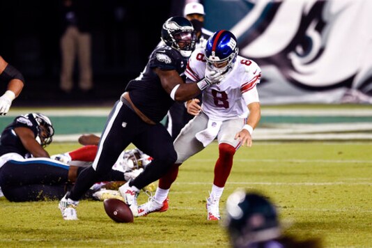 New York Giants' Daniel Jones (8) fumbles after being hit by Philadelphia Eagles' Brandon Graham (55) during the second half of an NFL football game, Thursday, Oct. 22, 2020, in Philadelphia. (AP Photo/Derik Hamilton) New York Giants' Daniel Jones (8) fumbles after being hit by Philadelphia Eagles' Brandon Graham (55) during the second half of an NFL football game, Thursday, Oct. 22, 2020, in Philadelphia. (AP Photo/Derik Hamilton)