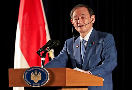 Japanese Prime Minister Yoshihide Suga speaks to the media during a press conference in Jakarta, Indonesia, Wednesday, Oct. 21, 2020. Suga is on a four-day visit to Vietnam and Indonesia. (AP Photo/Dita Alangkara, Pool) Japanese Prime Minister Yoshihide Suga speaks to the media during a press conference in Jakarta, Indonesia, Wednesday, Oct. 21, 2020. Suga is on a four-day visit to Vietnam and Indonesia. (AP Photo/Dita Alangkara, Pool)