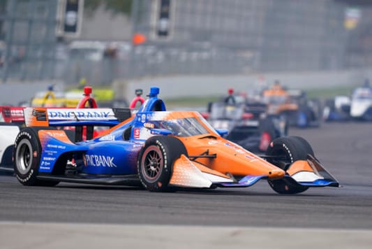 Scott Dixon, of New Zealand, drives into a turn during an IndyCar auto race at Indianapolis Motor Speedway, Friday, Oct. 2, 2020, in Indianapolis. (AP Photo/Darron Cummings) Scott Dixon, of New Zealand, drives into a turn during an IndyCar auto race at Indianapolis Motor Speedway, Friday, Oct. 2, 2020, in Indianapolis. (AP Photo/Darron Cummings)