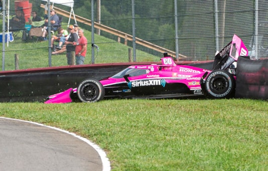 Jack Harvey of England (60) hits the fence during qualifying for the IndyCar Series auto race, at Mid-Ohio Sports Car Course, Sunday, Sept. 13, 2020, in Lexington, Ohio. (AP Photo/Phil Long) Jack Harvey of England (60) hits the fence during qualifying for the IndyCar Series auto race, at Mid-Ohio Sports Car Course, Sunday, Sept. 13, 2020, in Lexington, Ohio. (AP Photo/Phil Long)