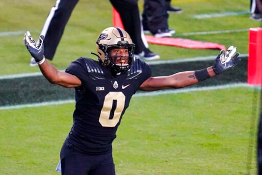 Purdue wide receiver Milton Wright (0) celebrates a touchdown by Purdue wide receiver David Bell (3) during the fourth quarter of an NCAA college football game against Iowa in West Lafayette, Ind., Saturday, Oct. 24, 2020. Purdue defeated Iowa 24-20. (AP Photo/Michael Conroy) Purdue wide receiver Milton Wright (0) celebrates a touchdown by Purdue wide receiver David Bell (3) during the fourth quarter of an NCAA college football game against Iowa in West Lafayette, Ind., Saturday, Oct. 24, 2020. Purdue defeated Iowa 24-20. (AP Photo/Michael Conroy)