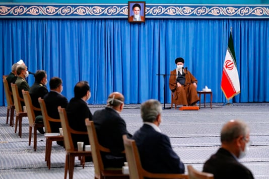 In this picture released by the official website of the office of the Iranian supreme leader, Supreme Leader Ayatollah Ali Khamenei, wearing a mask to protect against COVID-19, attends a meeting with National Corona Headquarters, in Tehran, Iran, Saturday, Oct. 24, 2020. (Office of the Iranian Supreme Leader via AP) In this picture released by the official website of the office of the Iranian supreme leader, Supreme Leader Ayatollah Ali Khamenei, wearing a mask to protect against COVID-19, attends a meeting with National Corona Headquarters, in Tehran, Iran, Saturday, Oct. 24, 2020. (Office of the Iranian Supreme Leader via AP)