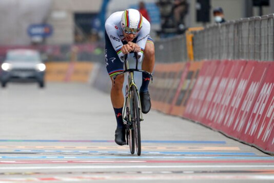 Reigning World Champion Italy's Filippo Ganna competes during the final stage of the Giro d'Italia cycling race, a 15.7 kilometers (9.756 miles) individual time trial from Cernusco sul Naviglio to Milan, Italy, Sunday, Oct. 25, 2020. (AP Photo/Luca Bruno) Reigning World Champion Italy's Filippo Ganna competes during the final stage of the Giro d'Italia cycling race, a 15.7 kilometers (9.756 miles) individual time trial from Cernusco sul Naviglio to Milan, Italy, Sunday, Oct. 25, 2020. (AP Photo/Luca Bruno)