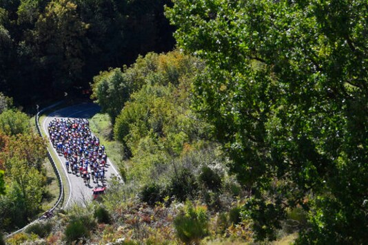 The pack pedals during the sixth stage of the Giro d'Italia cycling race, from Castrovillari to Matera, southern Italy, Thursday, Oct. 8, 2020. (Fabio Ferrari/LaPresse via AP)