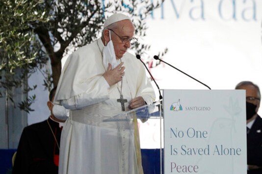 Pope Francis speaks during an inter-religious ceremony for peace in the square outside Rome's City Hall, Tuesday, Oct. 20, 2020 (AP Photo/Gregorio Borgia) Pope Francis speaks during an inter-religious ceremony for peace in the square outside Rome's City Hall, Tuesday, Oct. 20, 2020 (AP Photo/Gregorio Borgia)