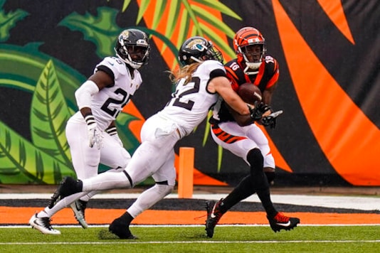 Jacksonville Jaguars free safety Andrew Wingard (42) breaks up a pass to Cincinnati Bengals wide receiver A.J. Green (18) in the second half of an NFL football game in Cincinnati, Sunday, Oct. 4, 2020. (AP Photo/Bryan Woolston) Jacksonville Jaguars free safety Andrew Wingard (42) breaks up a pass to Cincinnati Bengals wide receiver A.J. Green (18) in the second half of an NFL football game in Cincinnati, Sunday, Oct. 4, 2020. (AP Photo/Bryan Woolston)