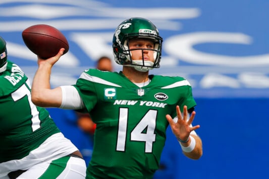 New York Jets quarterback Sam Darnold (14) throws a pass during the first half of an NFL football game against the Buffalo Bills in Orchard Park, N.Y., Sunday, Sept. 13, 2020. (AP Photo/Jeffrey T. Barnes) New York Jets quarterback Sam Darnold (14) throws a pass during the first half of an NFL football game against the Buffalo Bills in Orchard Park, N.Y., Sunday, Sept. 13, 2020. (AP Photo/Jeffrey T. Barnes)