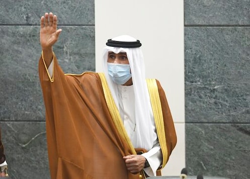 The new Emir of Kuwait Sheikh Nawaf Al Ahmad Al Sabah, waves after he performed the constitutional oath at the Kuwaiti National Assembly in Kuwait, Wednesday, Sept. 30, 2020. Kuwait's Sheikh Nawaf Al Ahmad Al Sabah was sworn in Wednesday as the ruling emir of the tiny oil-rich country, propelled to power by the death of his half-brother after a long career in the security services. (AP Photo/Jaber Abdulkhaleg) The new Emir of Kuwait Sheikh Nawaf Al Ahmad Al Sabah, waves after he performed the constitutional oath at the Kuwaiti National Assembly in Kuwait, Wednesday, Sept. 30, 2020. Kuwait's Sheikh Nawaf Al Ahmad Al Sabah was sworn in Wednesday as the ruling emir of the tiny oil-rich country, propelled to power by the death of his half-brother after a long career in the security services. (AP Photo/Jaber Abdulkhaleg)