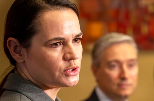 Belarusian opposition leader Svetlana Tikhanovskaya, foreground, speaks as Canadian Foreign Minister Francois-Philippe Champagne listens during a press conference in in Vilnius, Lithuania, Friday, Oct. 16, 2020. Canadas foreign minister met Friday with exiled top Belarusian opposition figure Sviatlana Tsikhanouskaya. The visit of Foreign Minister Francois-Philippe Champagne comes after European leaders, including French President Emmanuel Macron and German Chancellor Angela Merkel, have met with Tsikhanouskaya. (AP Photo/Mindaugas Kulbis) Belarusian opposition leader Svetlana Tikhanovskaya, foreground, speaks as Canadian Foreign Minister Francois-Philippe Champagne listens during a press conference in in Vilnius, Lithuania, Friday, Oct. 16, 2020. Canadas foreign minister met Friday with exiled top Belarusian opposition figure Sviatlana Tsikhanouskaya. The visit of Foreign Minister Francois-Philippe Champagne comes after European leaders, including French President Emmanuel Macron and German Chancellor Angela Merkel, have met with Tsikhanouskaya. (AP Photo/Mindaugas Kulbis)
