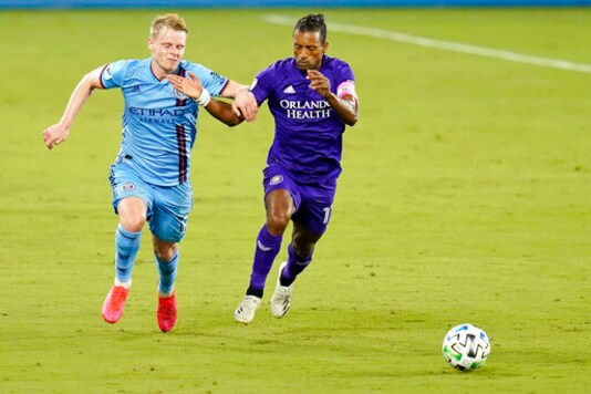 New York City FC midfielder Gary Mackay-Steven, left, fights for position on the ball against Orlando City forward Nani during the second half of an MLS soccer match, Wednesday, Oct. 14, 2020, in Orlando, Fla. (AP Photo/John Raoux) New York City FC midfielder Gary Mackay-Steven, left, fights for position on the ball against Orlando City forward Nani during the second half of an MLS soccer match, Wednesday, Oct. 14, 2020, in Orlando, Fla. (AP Photo/John Raoux)