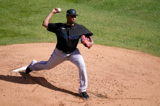 Miami Marlins starting pitcher Sixto Sanchez throws during the first inning in Game 2 of a National League wild-card baseball series against the Chicago Cubs Friday, Oct. 2, 2020, in Chicago. (AP Photo/Nam Y. Huh) Miami Marlins starting pitcher Sixto Sanchez throws during the first inning in Game 2 of a National League wild-card baseball series against the Chicago Cubs Friday, Oct. 2, 2020, in Chicago. (AP Photo/Nam Y. Huh)
