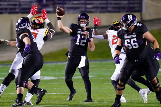 Northwestern quarterback Peyton Ramsey (12) throws a pass against Maryland during the first half of an NCAA college football game in Evanston, Ill., Saturday, Oct. 24, 2020. (AP Photo/Nam Y. Huh) Northwestern quarterback Peyton Ramsey (12) throws a pass against Maryland during the first half of an NCAA college football game in Evanston, Ill., Saturday, Oct. 24, 2020. (AP Photo/Nam Y. Huh)