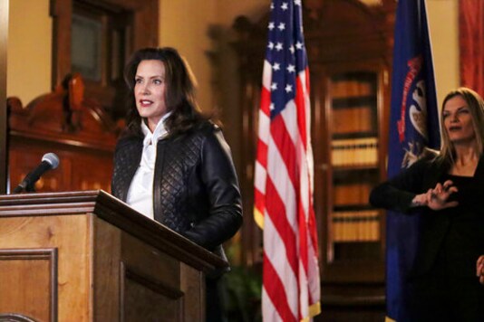 In a photo provided by the Michigan Office of the Governor, Michigan Gov. Gretchen Whitmer addresses the state during a speech in Lansing, Mich., Thursday, Oct. 8, 2020. The governor delivered remarks addressing Michiganders after the Michigan Attorney General, Michigan State Police, U.S. Department of Justice, and FBI announced state and federal charges against 13 members of two militia groups who were preparing to kidnap and possibly kill the governor. (Michigan Office of the Governor via AP) In a photo provided by the Michigan Office of the Governor, Michigan Gov. Gretchen Whitmer addresses the state during a speech in Lansing, Mich., Thursday, Oct. 8, 2020. The governor delivered remarks addressing Michiganders after the Michigan Attorney General, Michigan State Police, U.S. Department of Justice, and FBI announced state and federal charges against 13 members of two militia groups who were preparing to kidnap and possibly kill the governor. (Michigan Office of the Governor via AP)